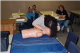 A Student Practicing CPR During Training Session