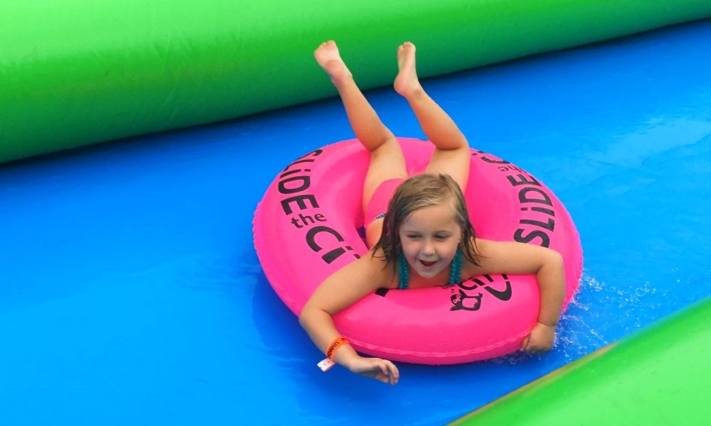 A girl slides during SlideCKVL.