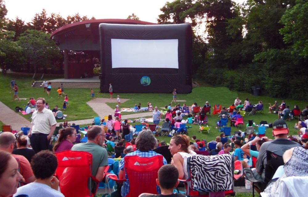 A crowd gathers for an After Dark movie at Dogwood Park.