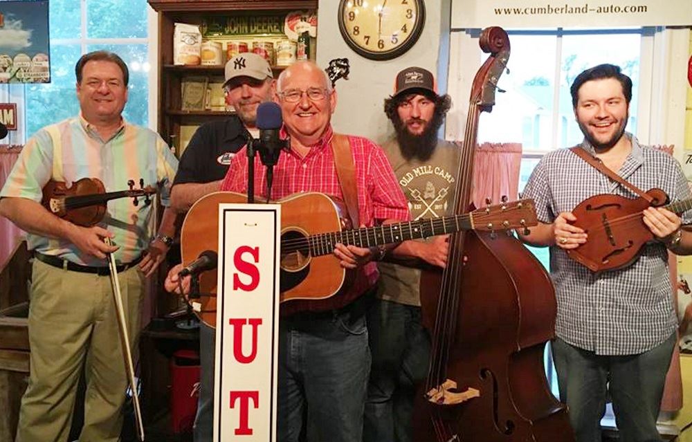 Bluegrass Solutions band members gather.