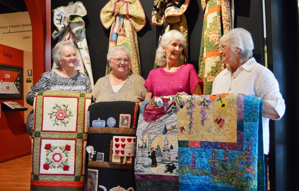 Cookeville Crazy Quilters members show their quilts at Cookeville History Museum.