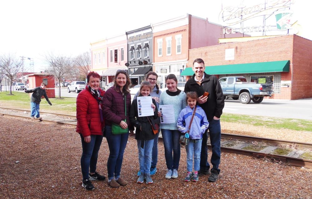 People participate in a WestSide Scavenger Hunt.