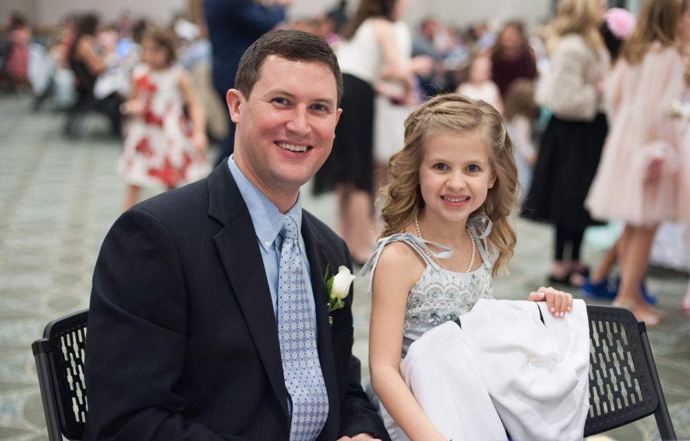 A father and daughter attend Father-Daughter Date Night.