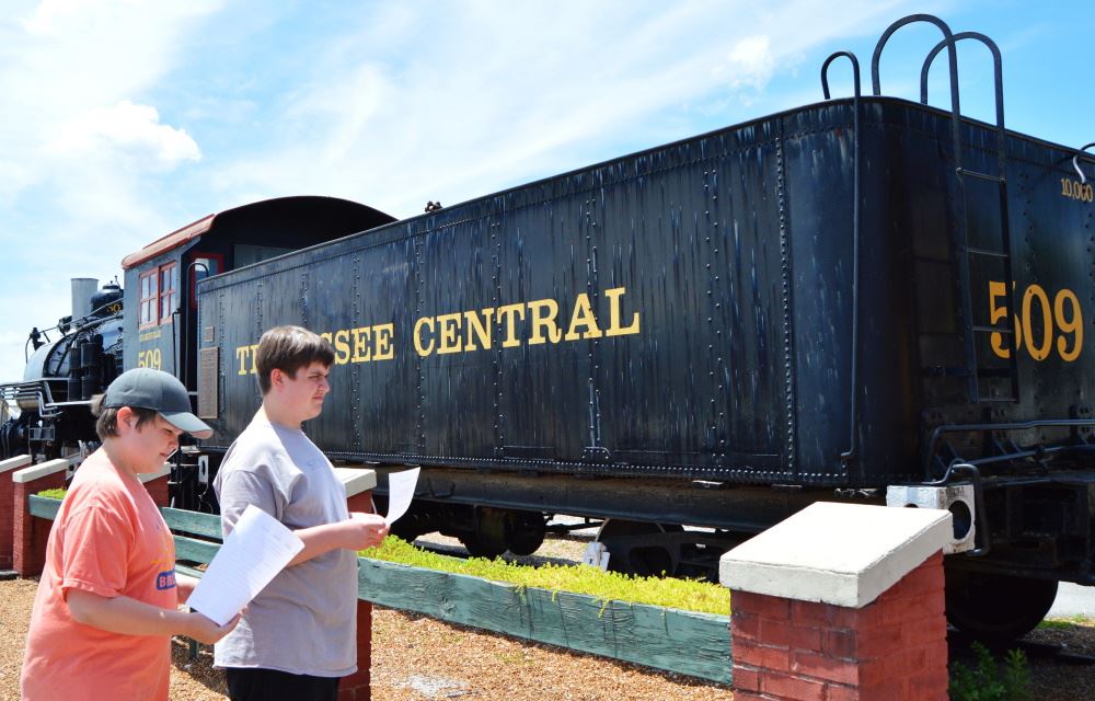 Depot visitors look for answers to trivia questions.