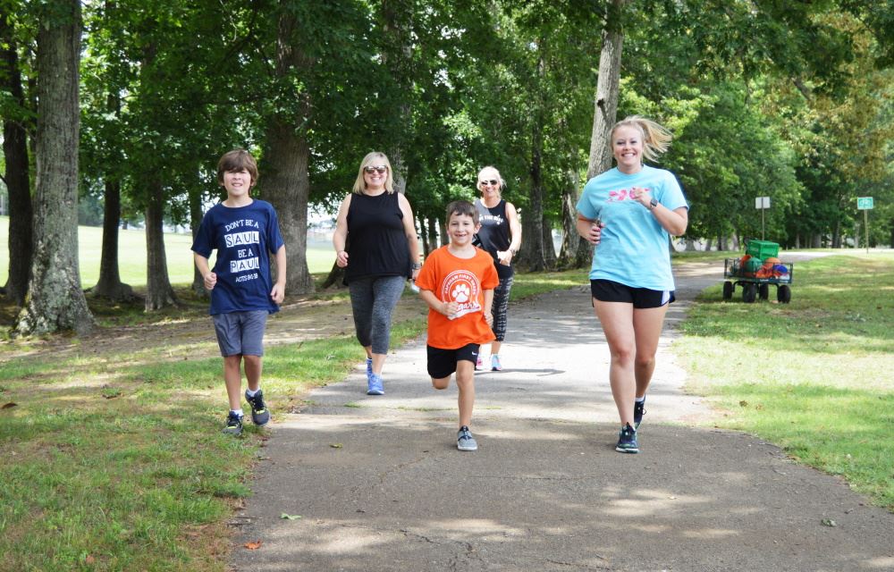 Runners prepare for the Watermelon Crawl virtual 5K.