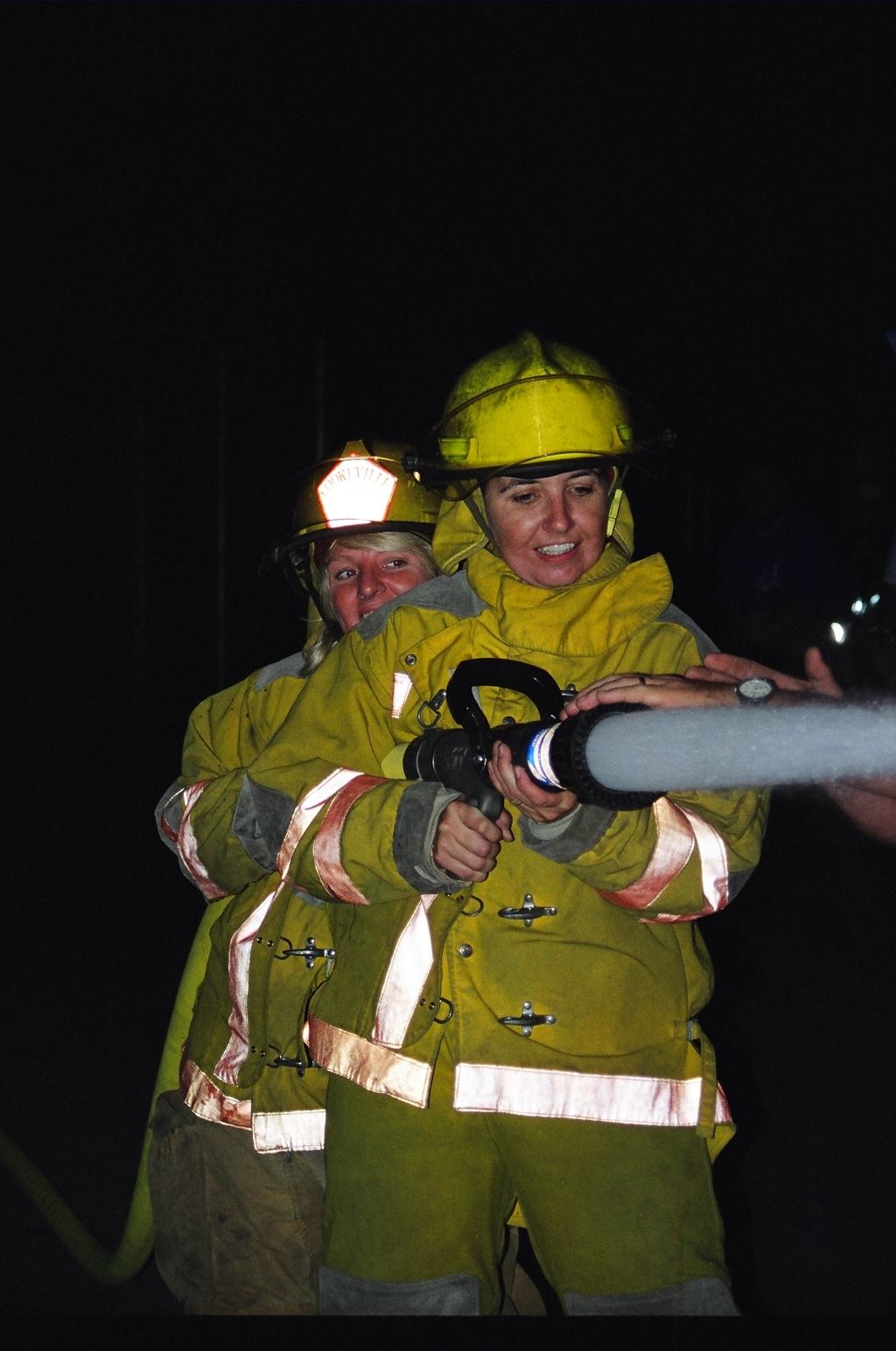 Fire Fighters Spraying Water